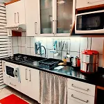 Apto com sacada e churrasq 100m Praia Brava COI302